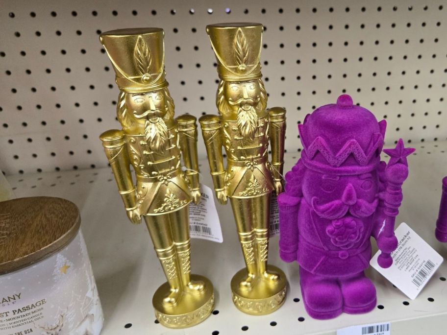 Joyward 10" Gold Nutcracker Figurines on shelf in store