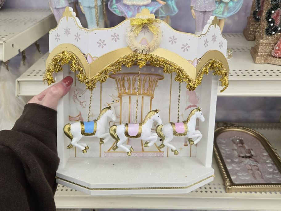 Carousel Tabletop D&eacute;cor&nbsp; in hand in store