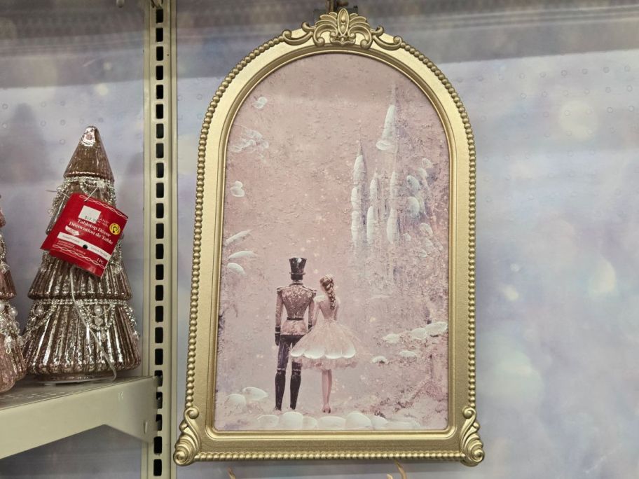 Fairytale Couple Framed Wall D&eacute;cor hanging in store