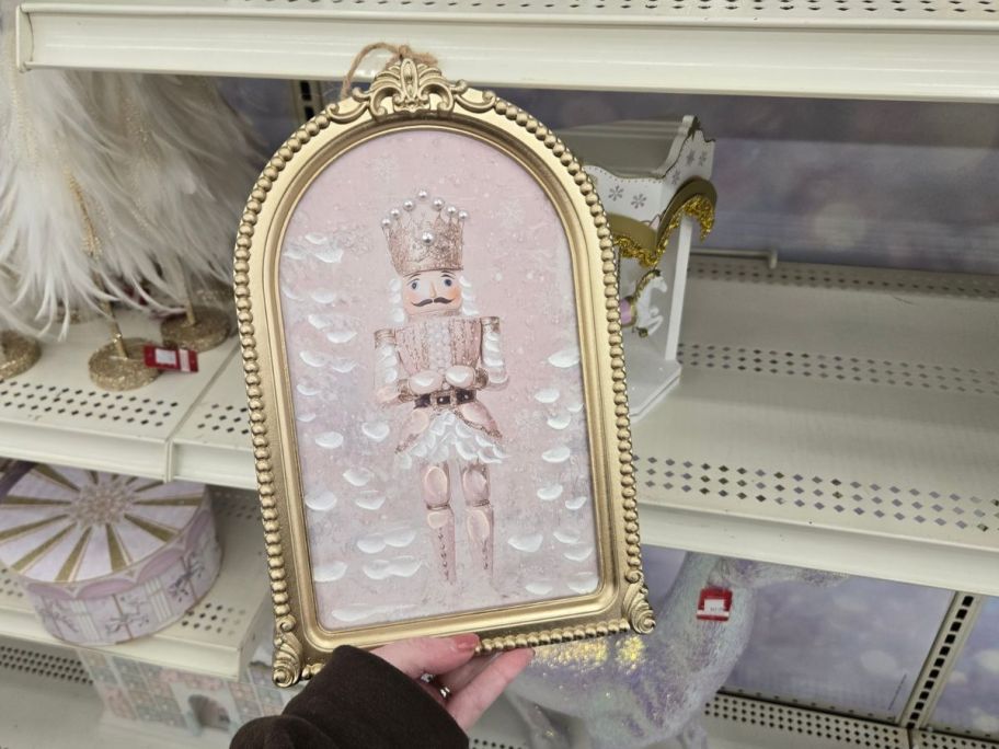 Pink Soldier Wall D&eacute;cor in hand in store