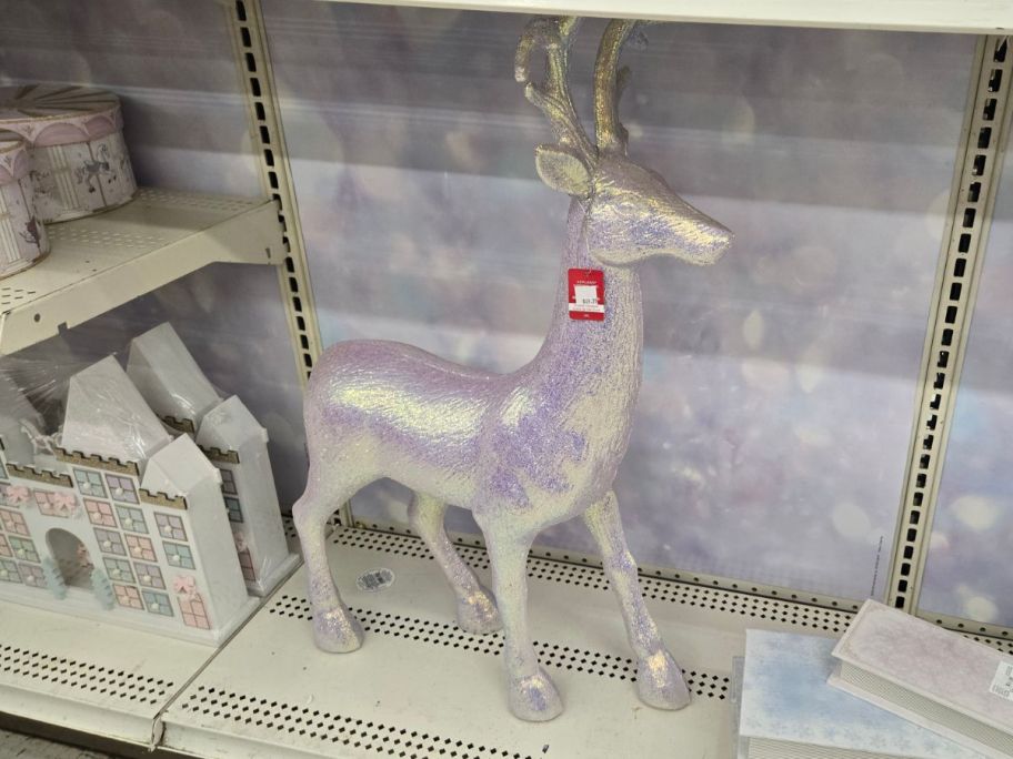 Glitter Reindeer Tabletop D&eacute;cor on shelf in store