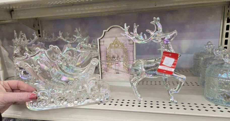 Sleigh & Reindeer Acrylic Tabletop D&eacute;cor on shelf in store