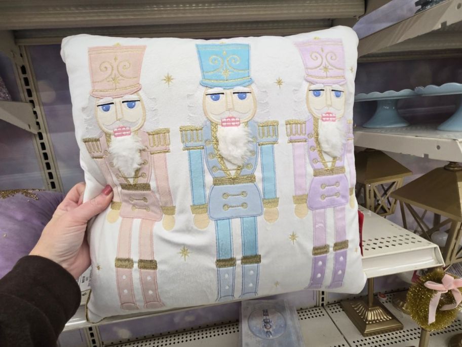 Nutcracker Soldiers Throw Pillow in hand in store