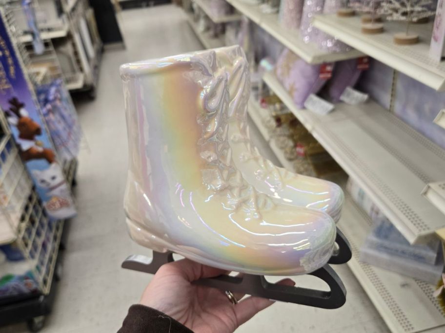 Ice Skates Ceramic Tabletop D&eacute;cor in hand in store