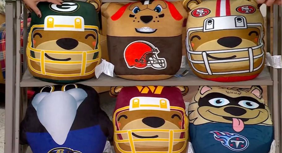 display of 6 different nfl plushes