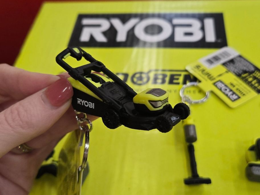 RYOBI Mini mower Keychain in hand in store