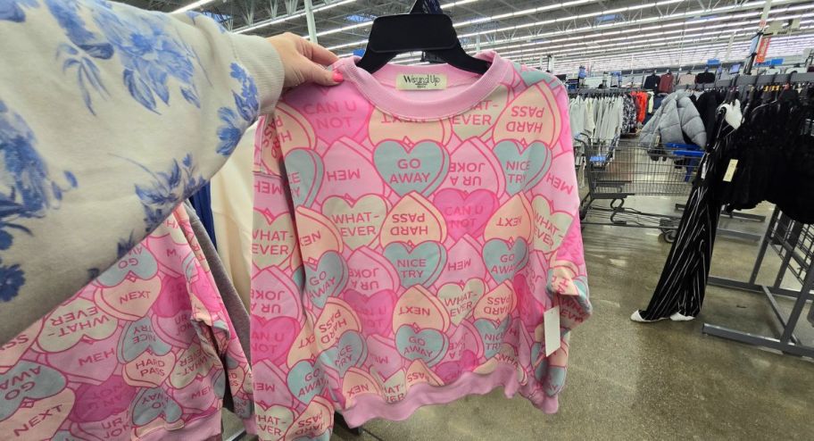 hand holding Candy Hearts Women's Graphic Sweatshirt