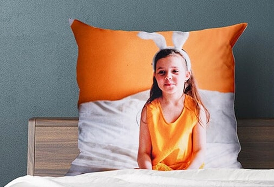 custom photo pillow on a bed