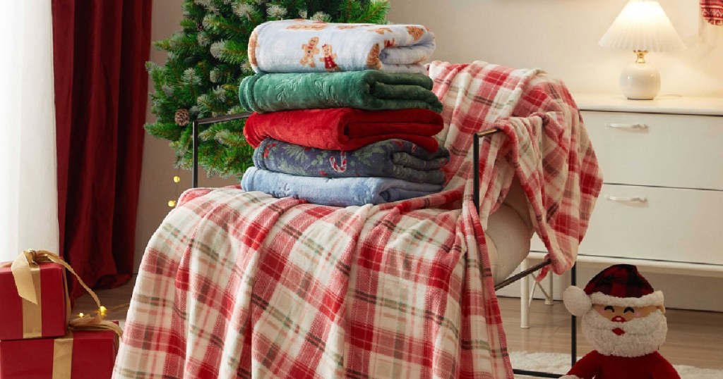 different holiday throw blankets on couch