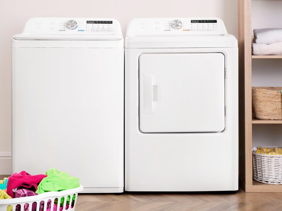 white washer and dryer set in a laundry room