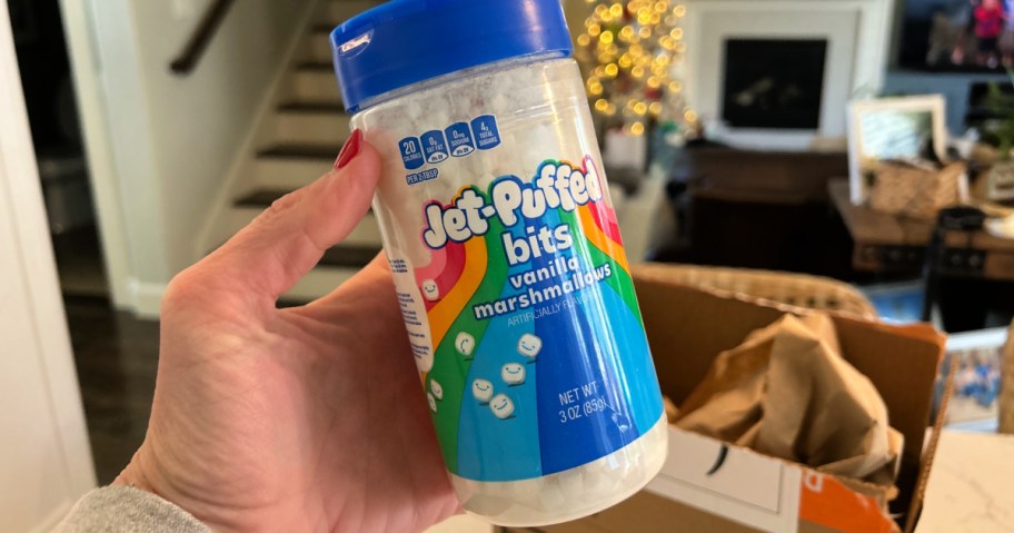 woman holding container of Jet Puffed marshmallow Bits marshmallow minis