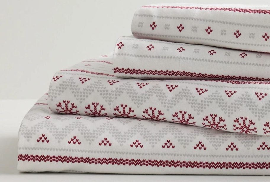 winter bedsheets in white and red on display