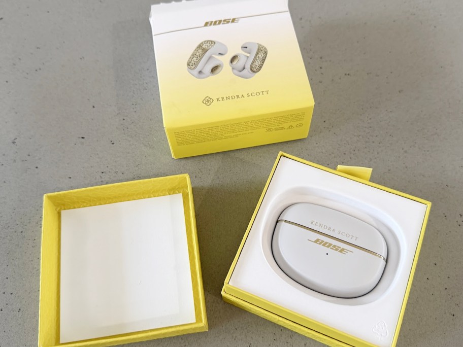 bose earbuds in box on table
