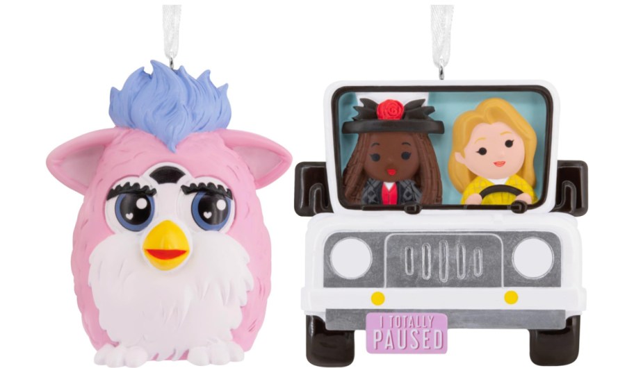 A Clueless Hallmark ornament and a pink Furby Hallmark ornament.