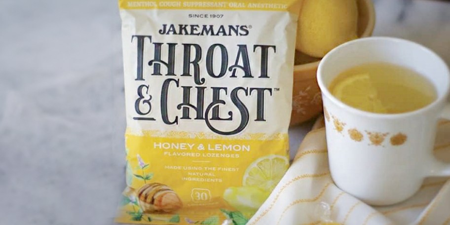 jakemans throat and chest drops bag next to cup of tea 