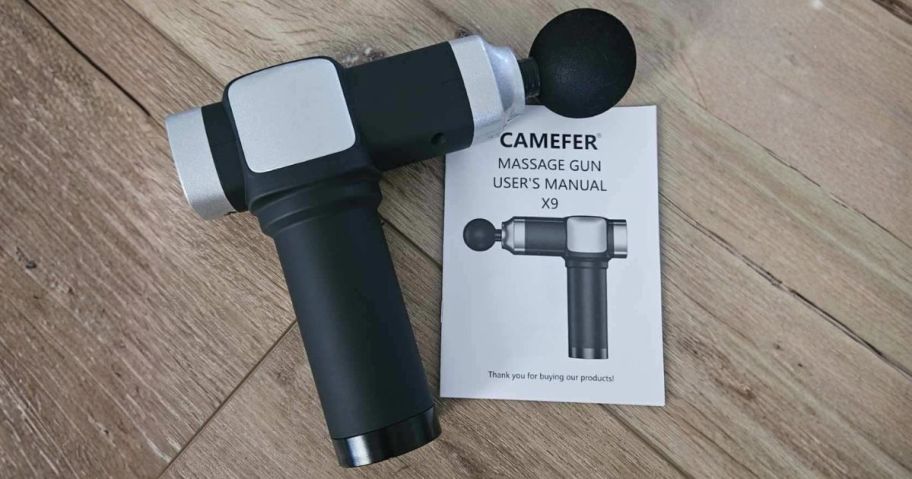 massage gun on table