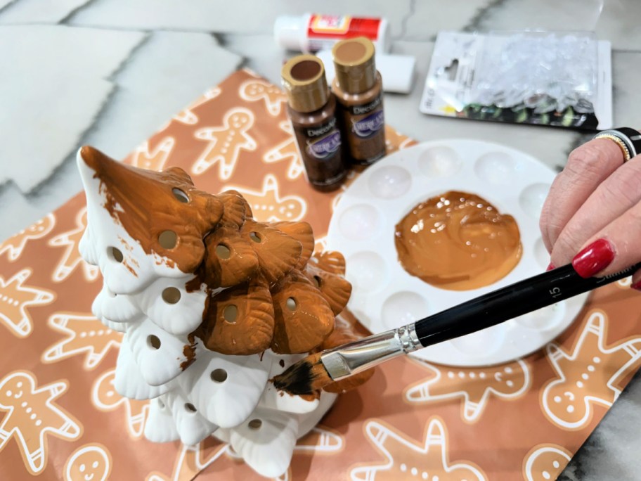 painting a ceramic christmas tree 