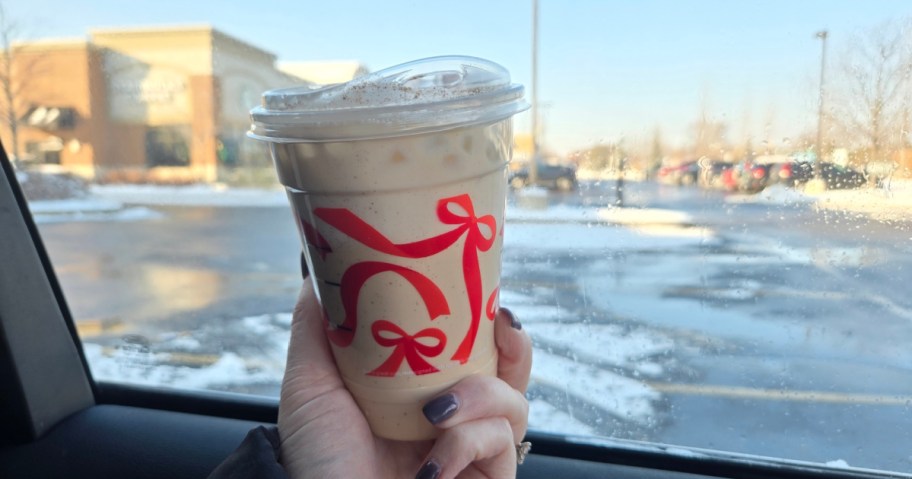 starbucks drink in hand
