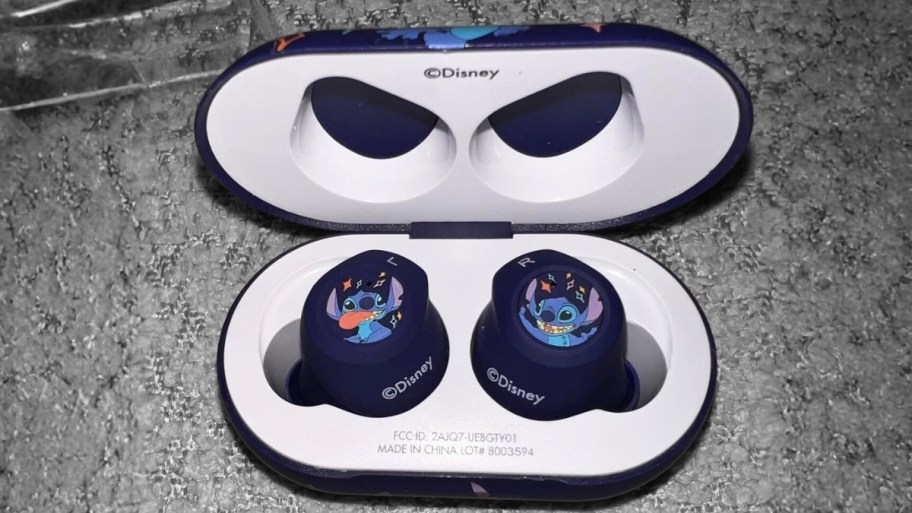 a pair of stitch bluetooth earbuds