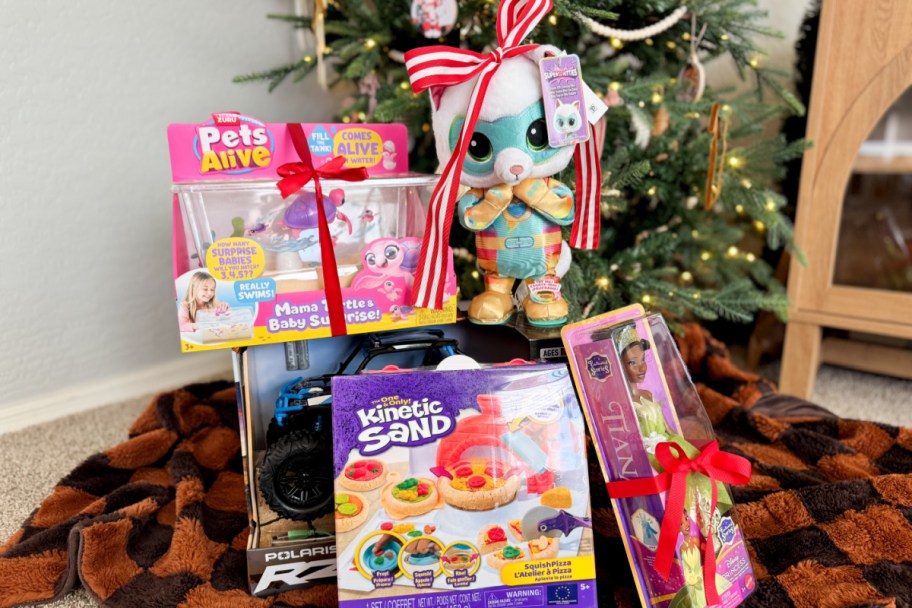 kids toys near christmas tree