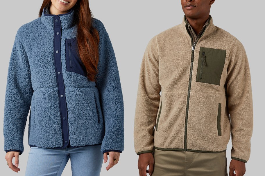 woman in blue jacket and man in tan jacket 