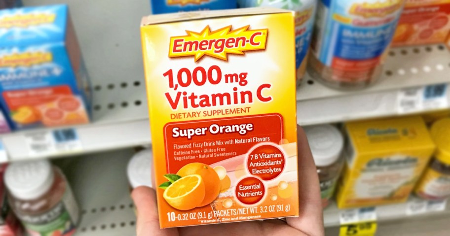 hand holding a box of Emergen-C Packets in store