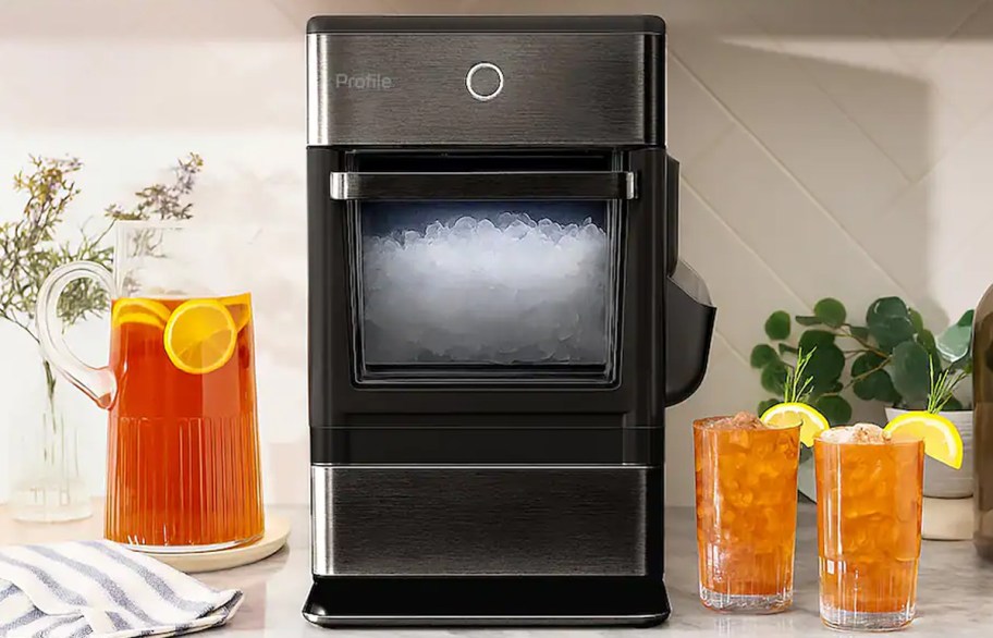 nugget ice maker on counter with glasses and pitcher of iced tea