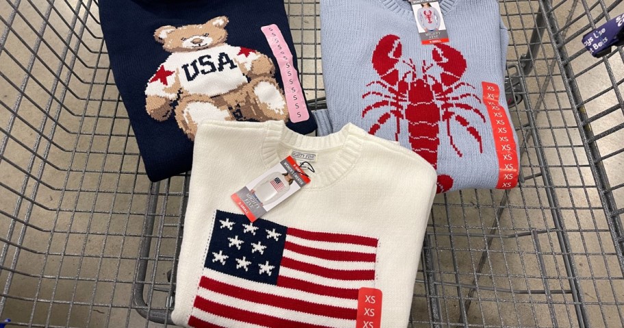 3 American themed women's sweaters in a shopping cart