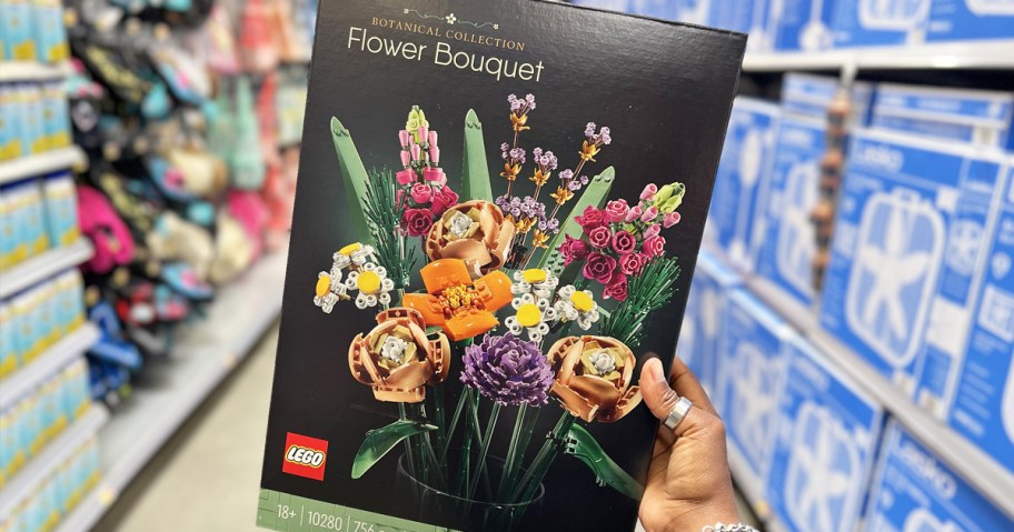 hand holding box for LEGO Botanicals Flower Bouquet set in store