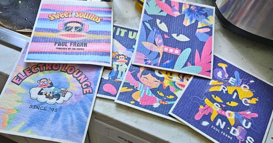 six Paul Frank Swedish Dishcloths on kitchen counter