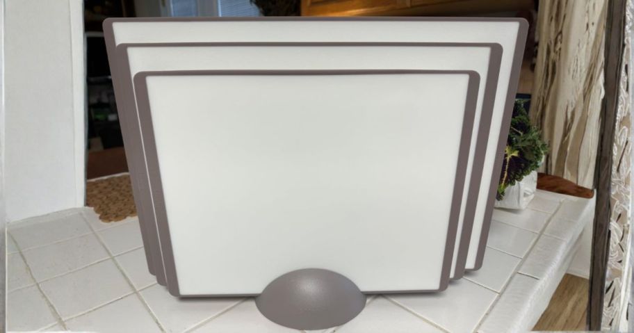 grey and white Plastic Cutting Board Set on counter