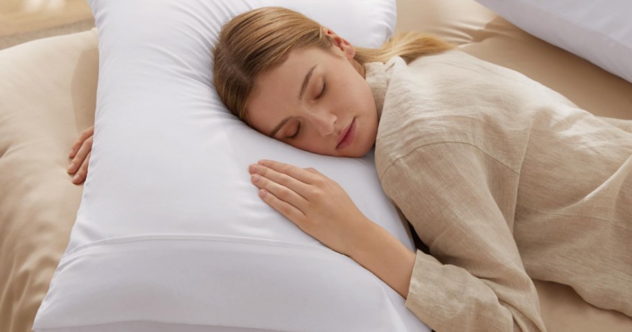 woman sleeping on a pillow