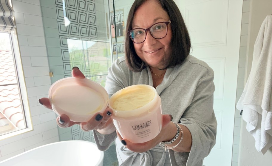 woman holding tub of colleen rothschild face cream