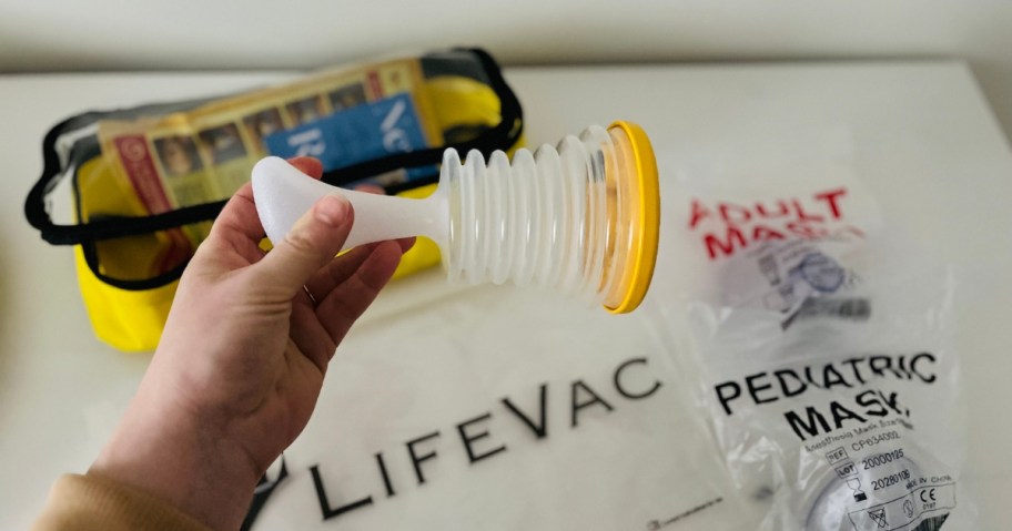 hand holding a Lifevac device