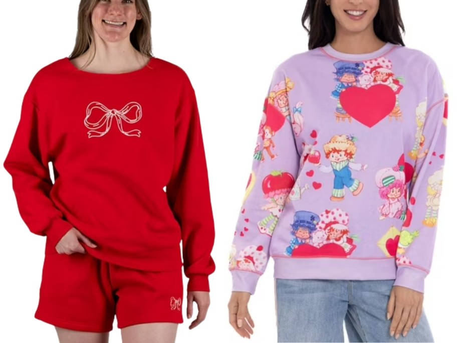 woman wearing a Valentine's sweatshirt and shorts and woman wearing a Strawberry Shortcake Valentine's sweatshirt and jeans