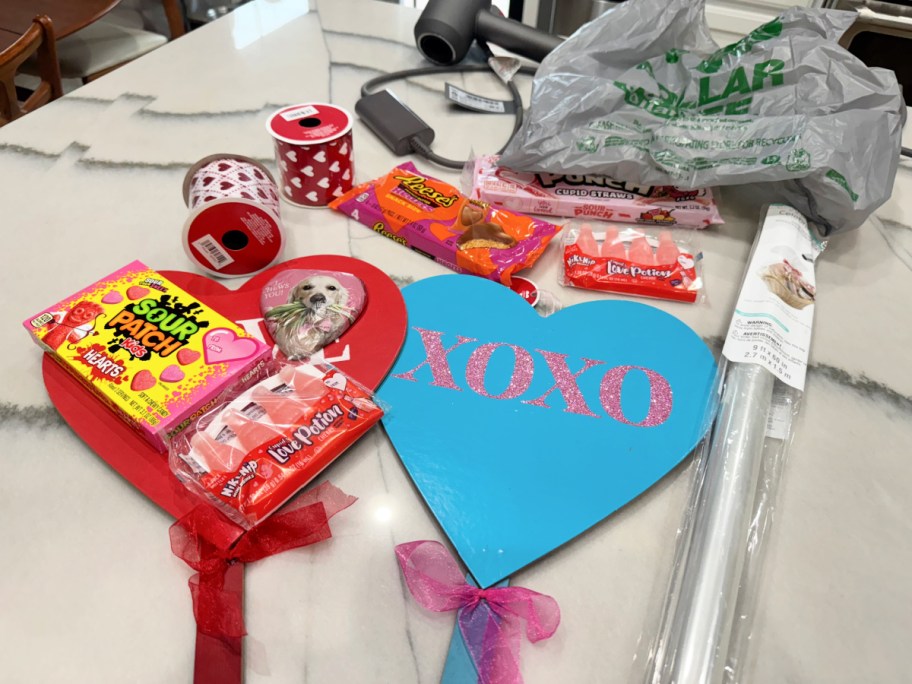 supplies needed to make diy heart gift baskets from dollar tree 
