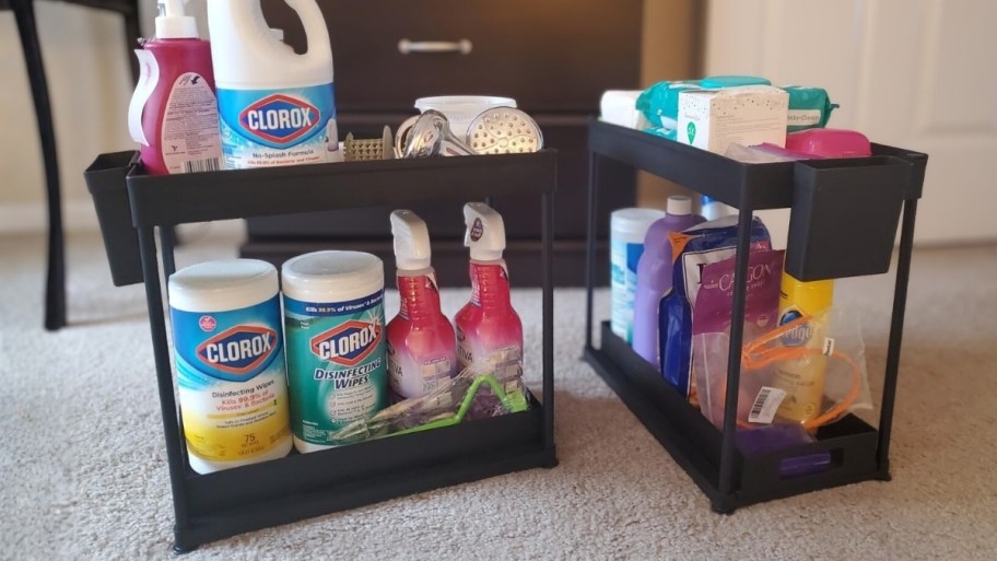 under sink storage organizers filled with cleaning products