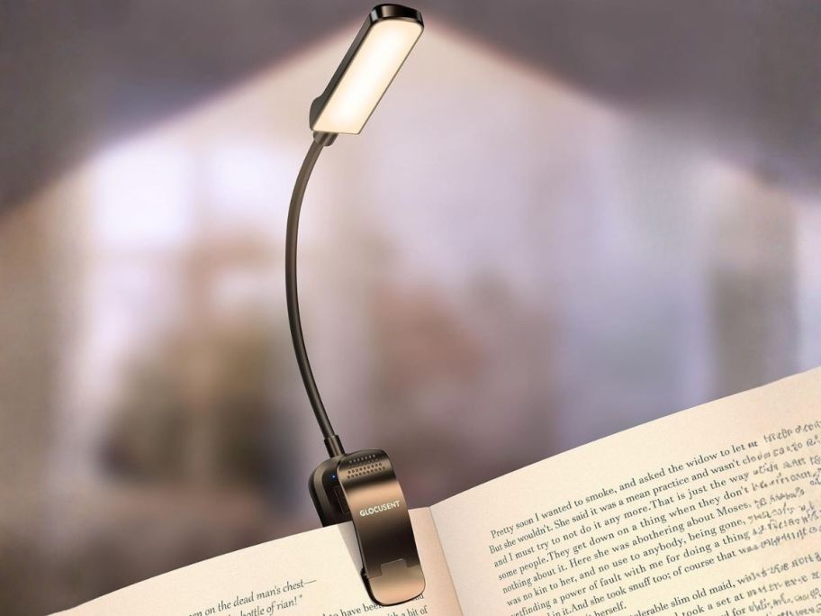 Glocusent Rechargeable Clip-On Book Light in Black on book