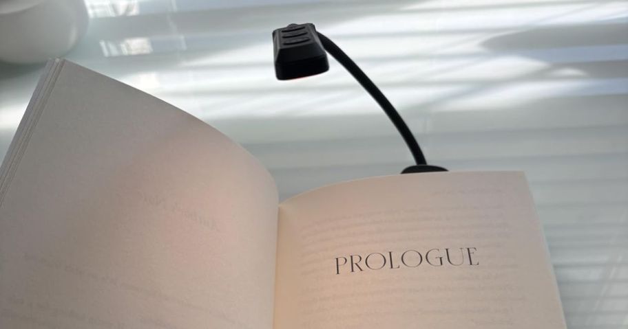 Glocusent Rechargeable Clip-On Book Light in Black on book