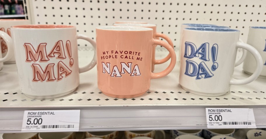 mom & dad themed coffee mugs on store shelf