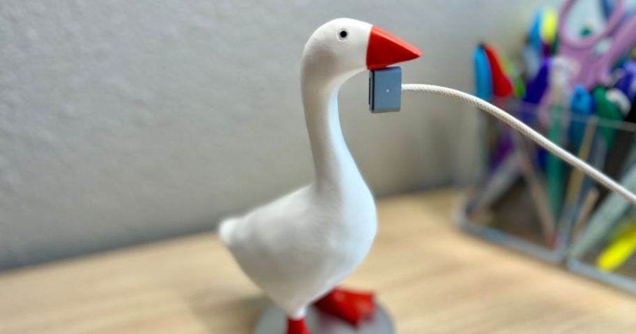 Losneg Magnetic Goose Key Holder holding cable on desk