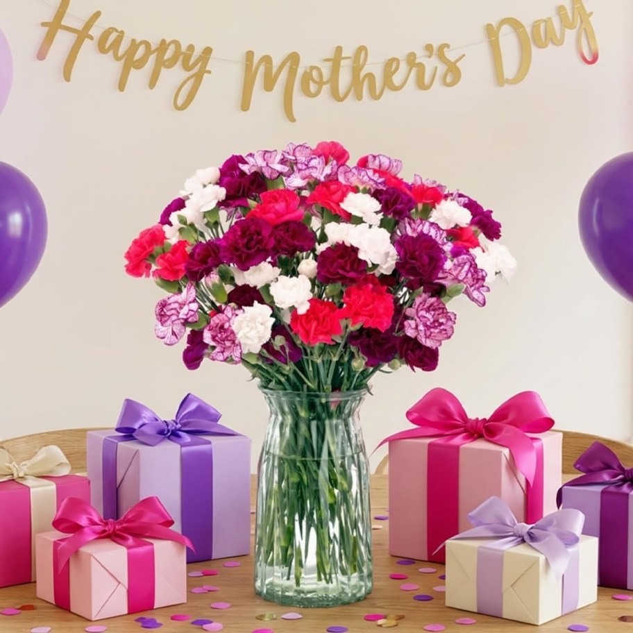 bouquet of pink flowers with mothers day banner
