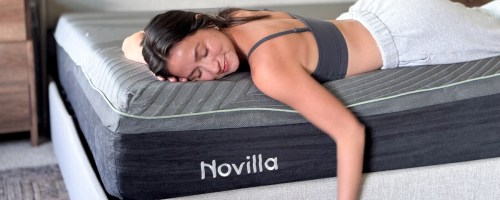 chelsey laying on Novilla AiryFlow™ Cooling Foam Mattress in bedroom