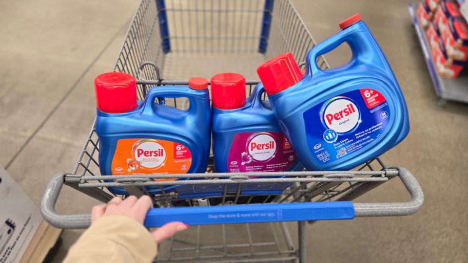 three bottles of persil in a shopping cart