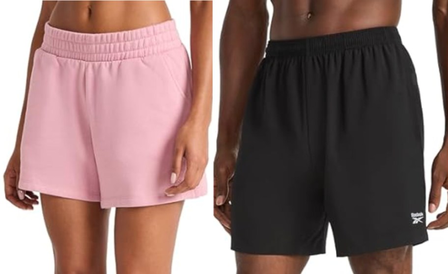 Two people are shown from the waist down. The left person wears light pink shorts, and the right person wears black Reebok shorts. Both shorts have elastic waistbands.