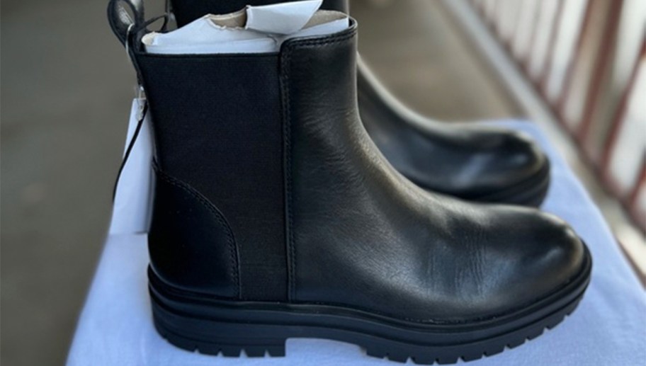 pair of black steve madden boots 