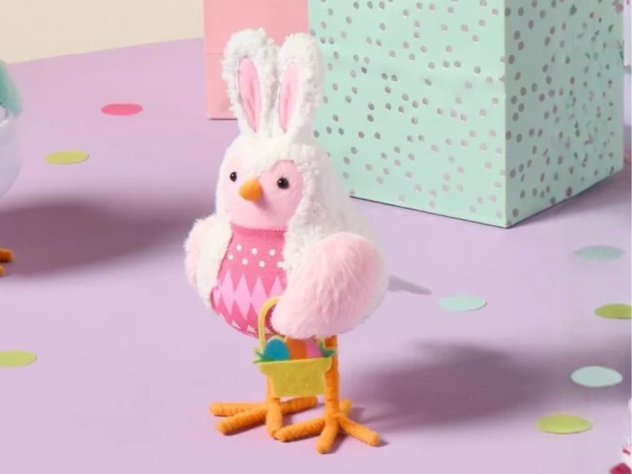 a decorative bird dressed as the Easter Bunny