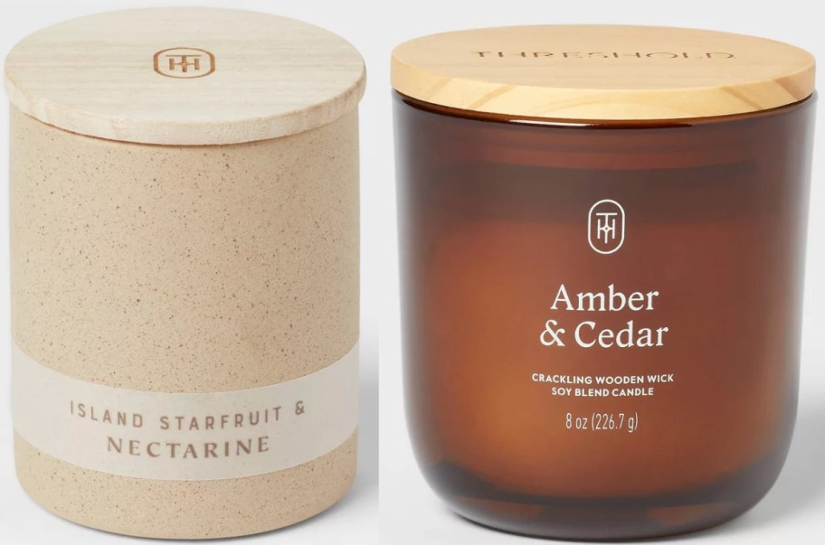 Two candles are shown. The left is in a beige container labeled "Island Starfruit & Nectarine." The right is a brown jar labeled "Amber & Cedar." Both have wooden lids.