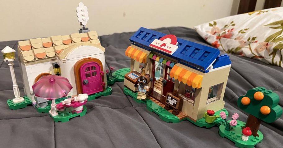Animal crossing LEGO set displayed on top of the bed