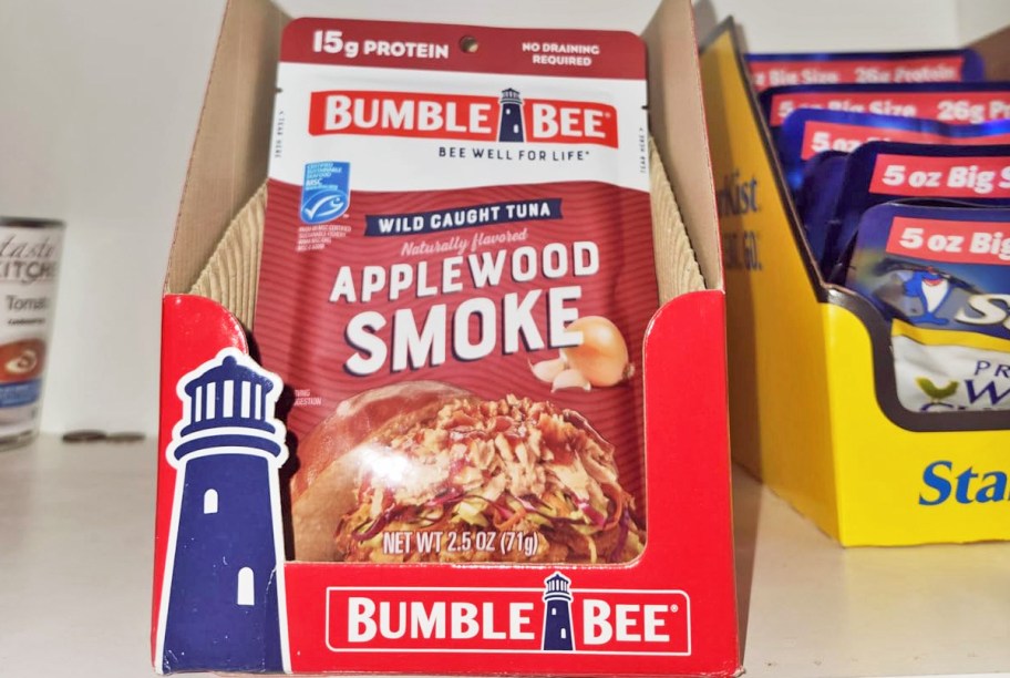 box of Bumble Bee Applewood Smoke Tuna Pouches on a pantry shelf